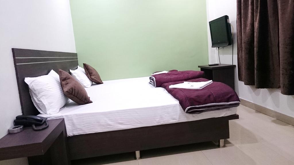 Hotel Preetam Aurangabad Pokoj fotografie